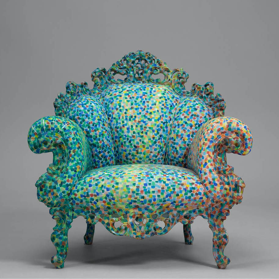 Baroque-style armchair covered in multicoloured dots