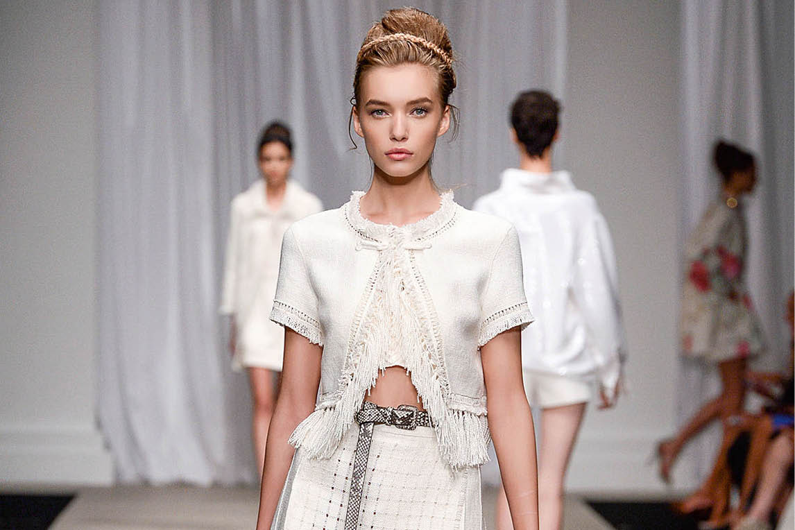 Models walking a fashion show runway