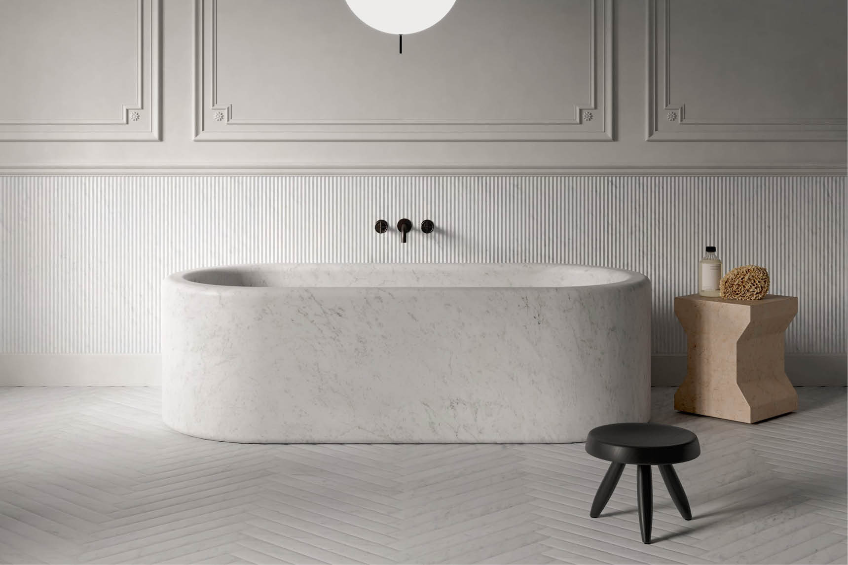 Freestanding marble bathtub in a bathroom with panelled walls