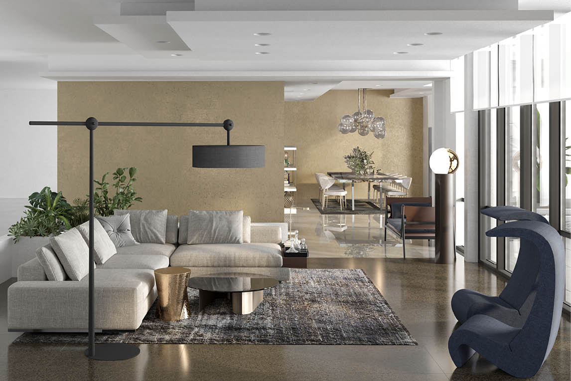 Open-plan living room with a white sectional sofa, a gold wall and a dining area